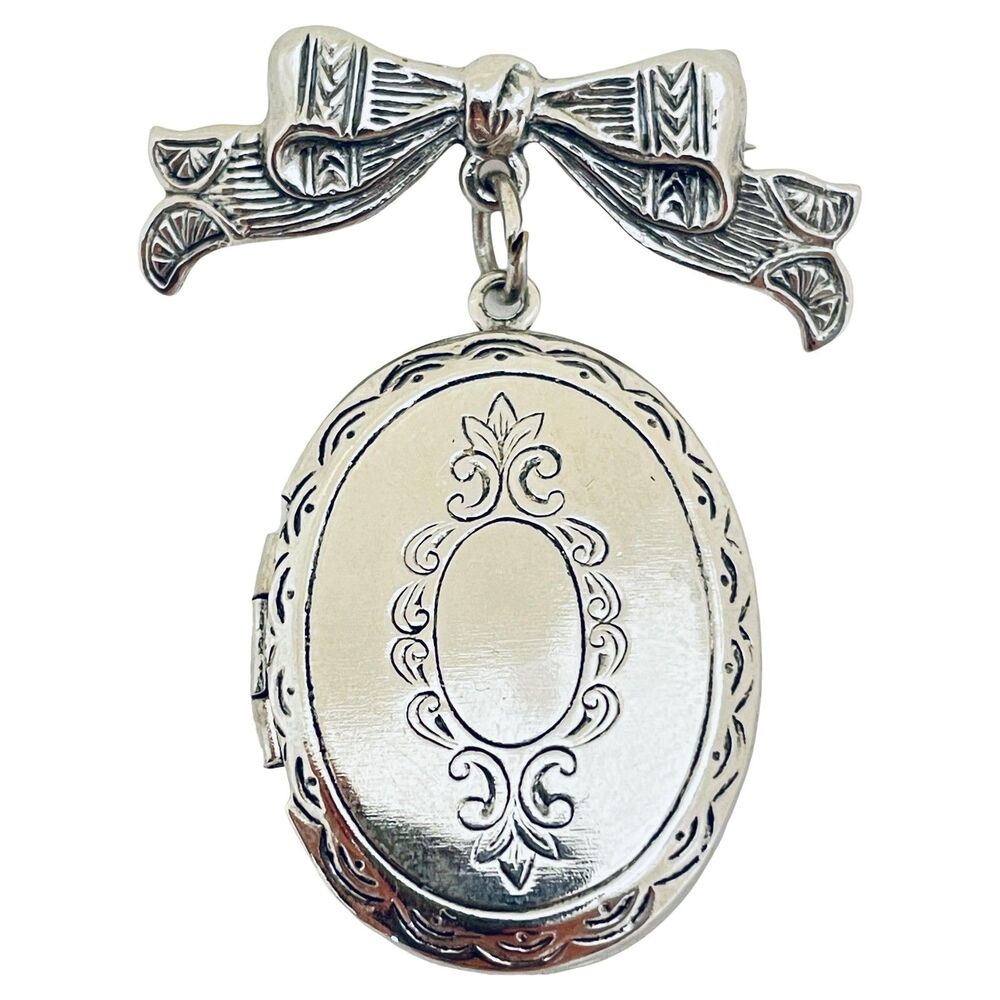 Vintage silver tone bow dangle locket designer brooch